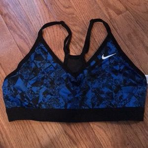 Blue and black Nike sports bra